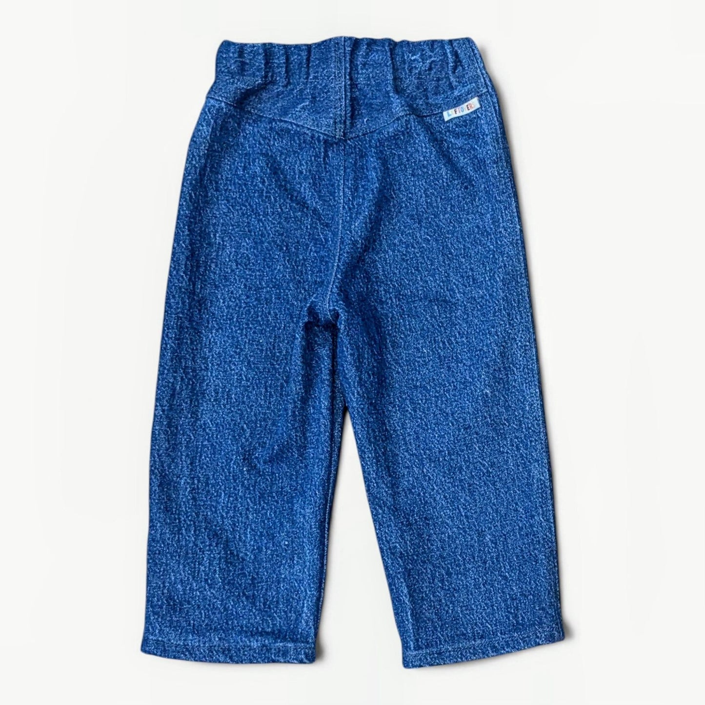 Leftovers club blue denim jeans for toddlers. Stevie straight style featuring an elastic waistband. Back view on white backgr