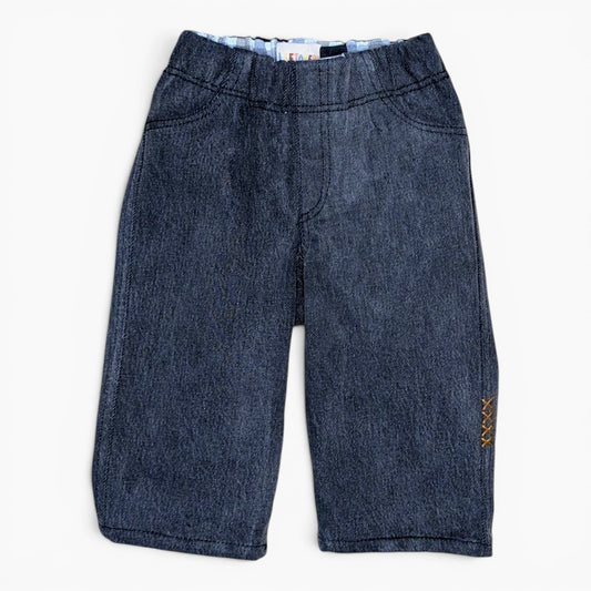 A pair of washed black denim pants for toddlers with an elastic waistband and decorative gold embroidered details on the side, shown flat on a white background.