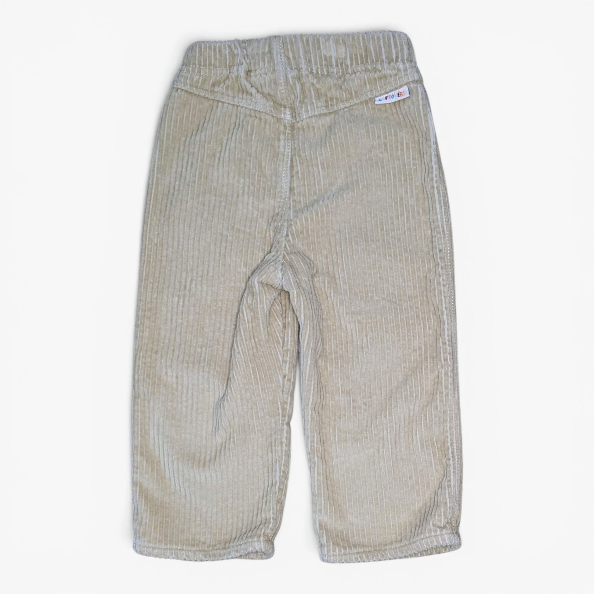 A pair of beige corduroy pants for toddlers, shown flat against a plain white background.