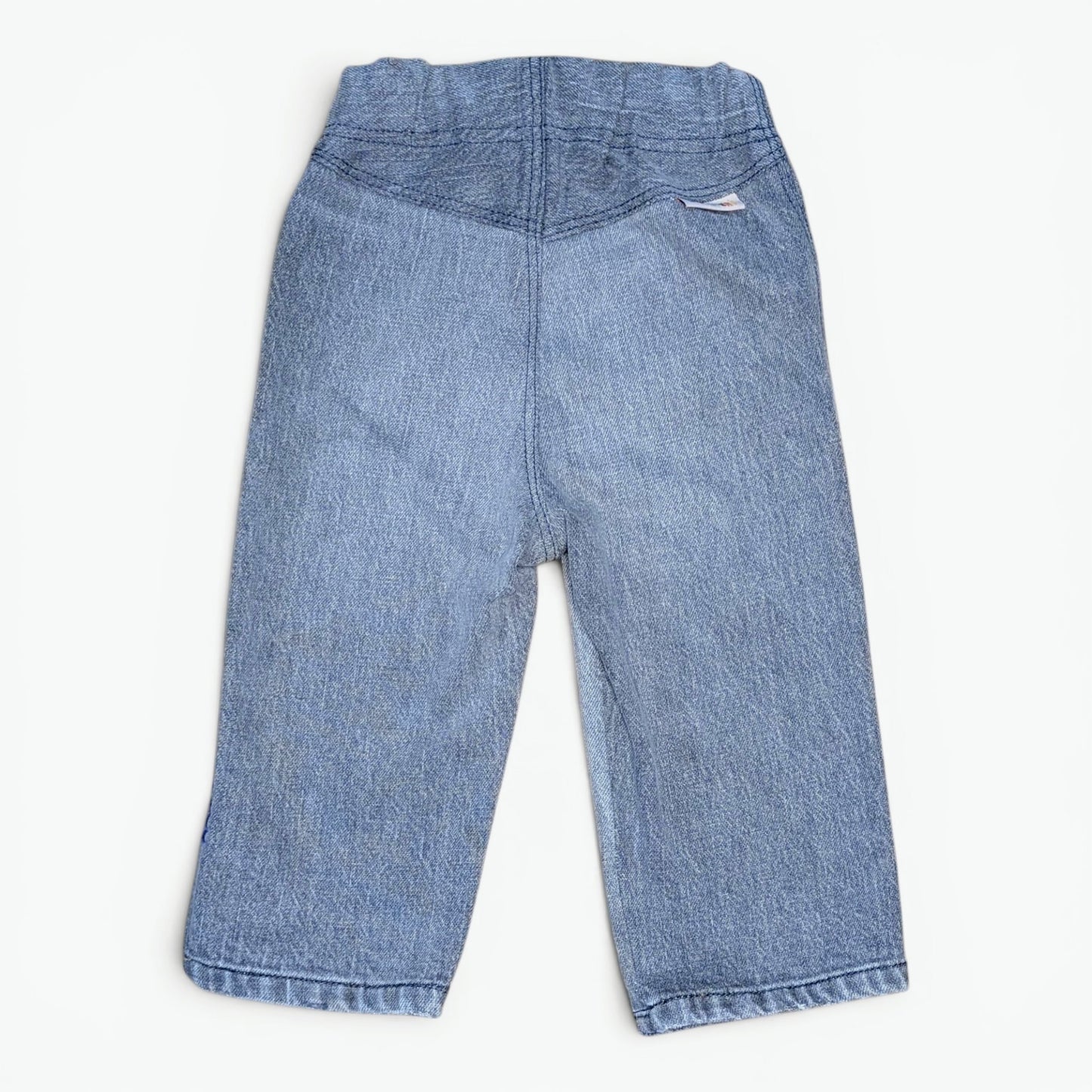 Light blue denim pants for toddlers, shown from the back on a clean white background.