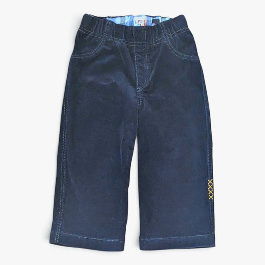 Leftovers club dark blue cord jeans for toddlers. Stevie straight style featuring an elastic waistband. Front view on white b