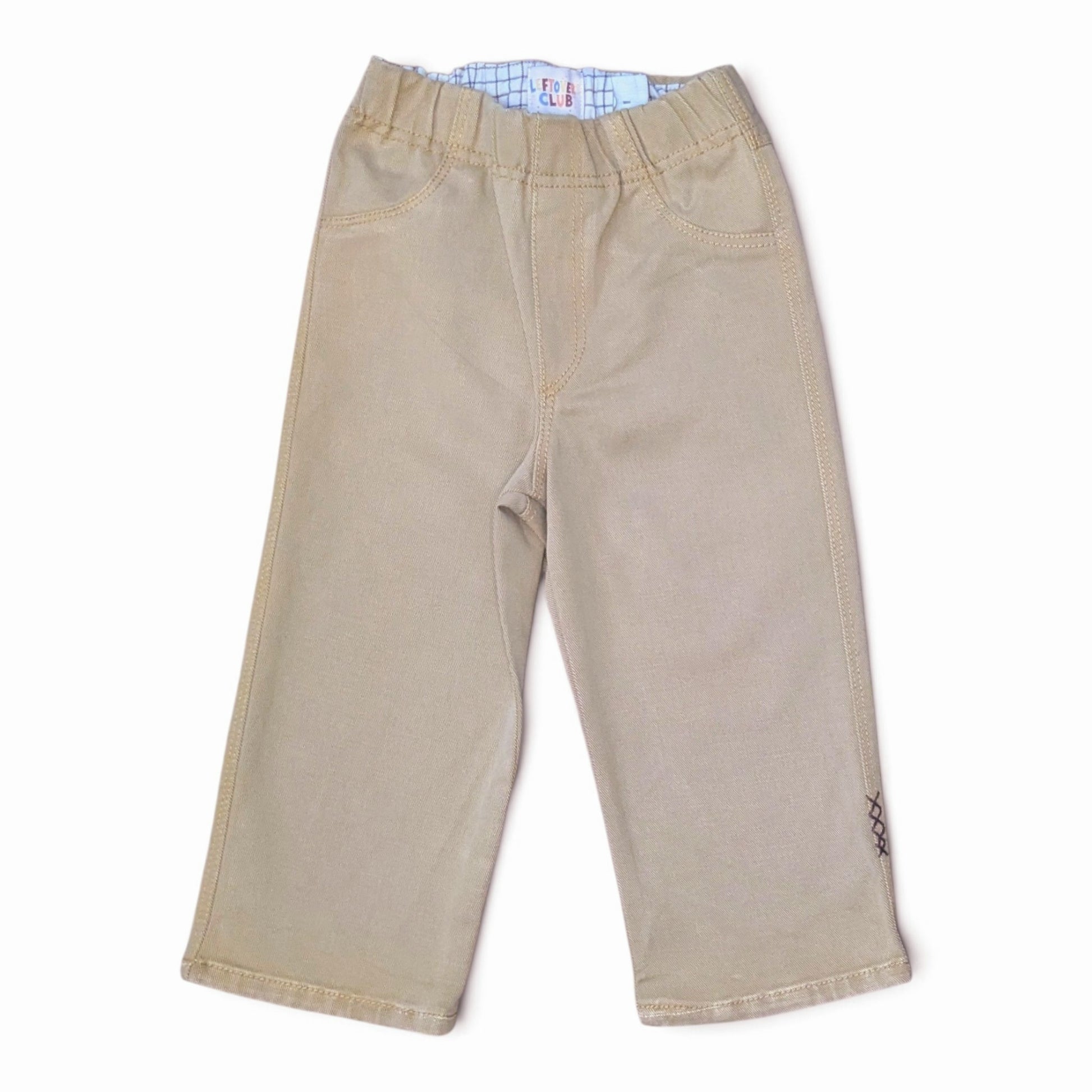 Leftovers club Tan drill jeans for toddlers. Stevie straight style featuring an elastic waistband. Front view on white backgr