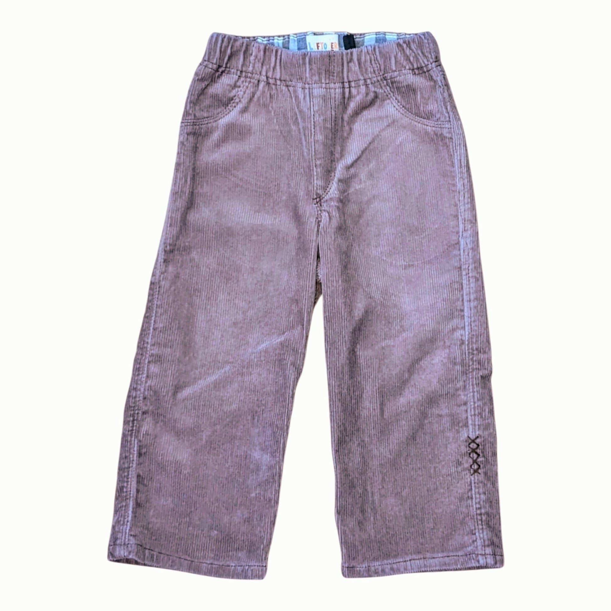 Leftovers club brown cord jeans for toddlers. Stevie straight style featuring an elastic waistband. Front view on white backg