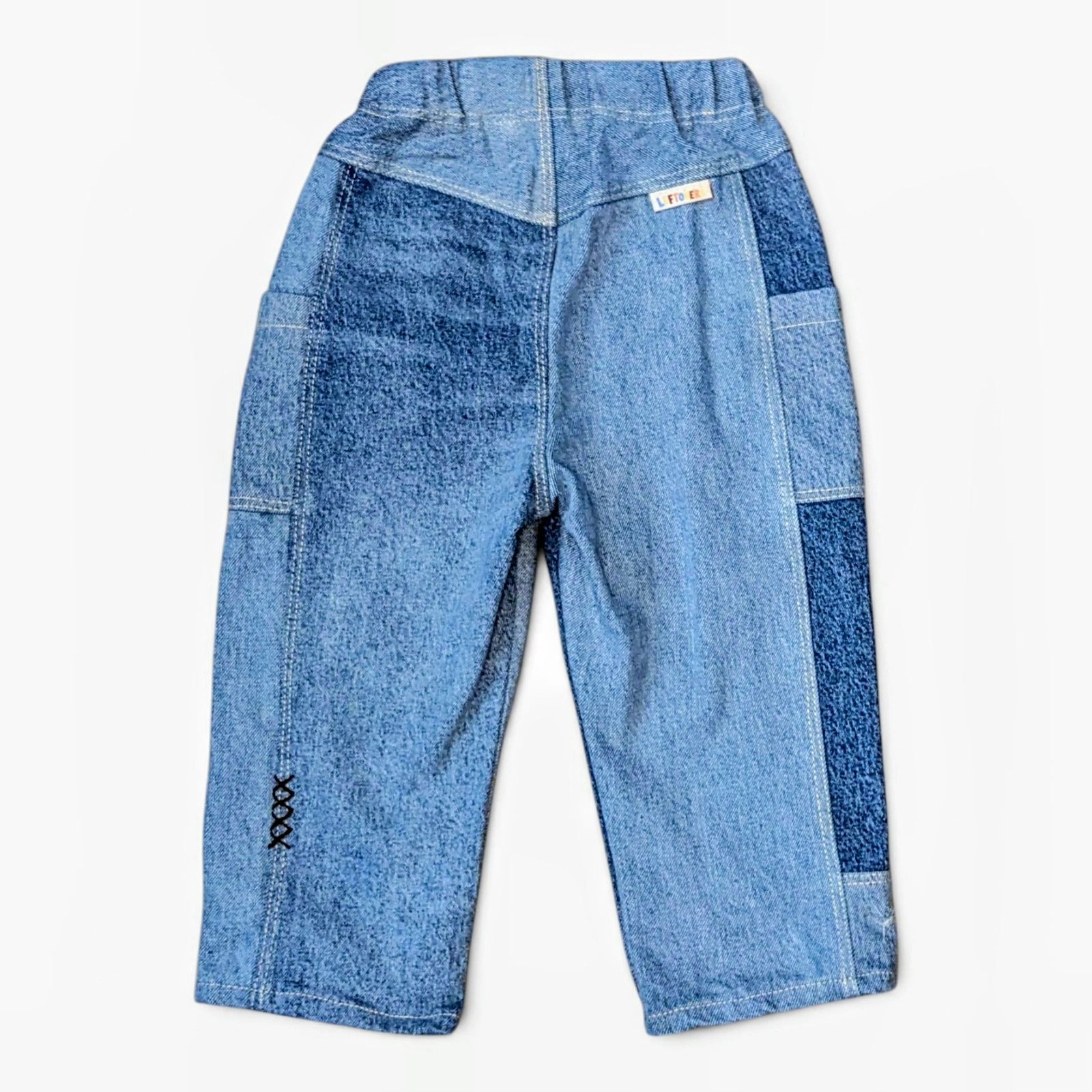 Leftovers club blue patchwork denim jeans for toddlers. Cameron Cargo style featuring side pockets and an elastic waistband.